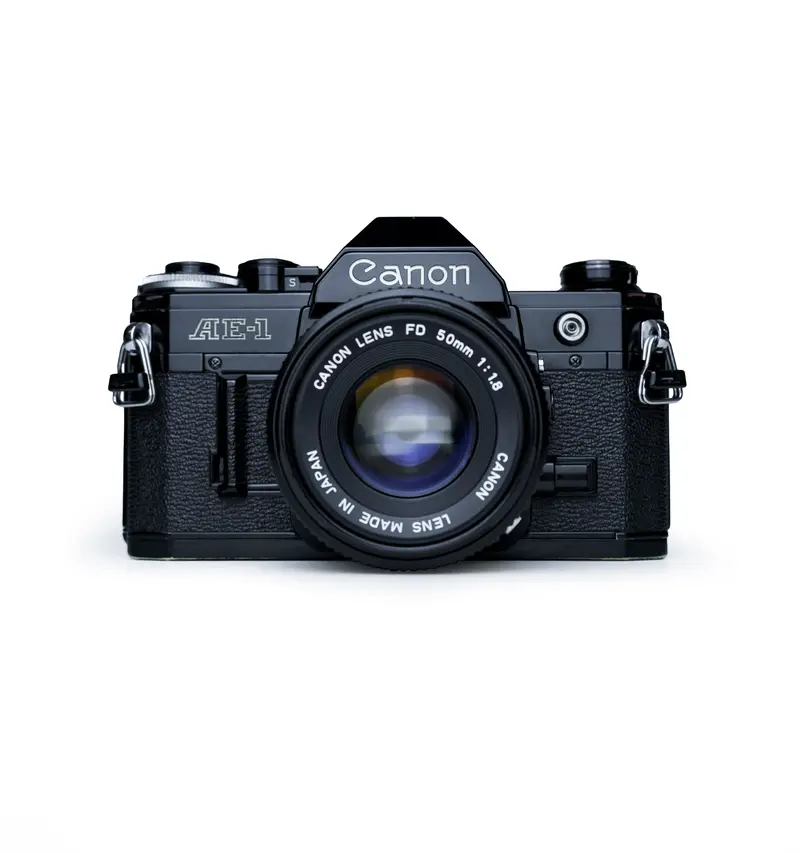 Canon AE-1 Black 35mm SLR Film Camera with 50mm F1.8 & 70-210mm F4 Lenses